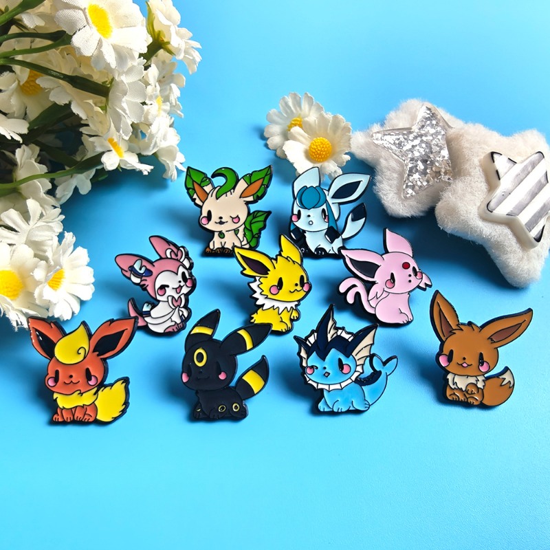 ホット9個入りアニメエルフブローチセット イーブイエナメルピ - Lapel Pin Enamel のレビューと価格